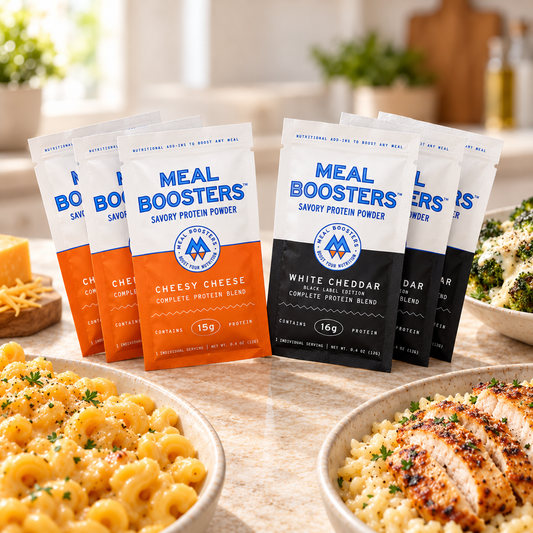 Six individual serving packets of Meal Boosters Cheesy Cheese and White Cheddar